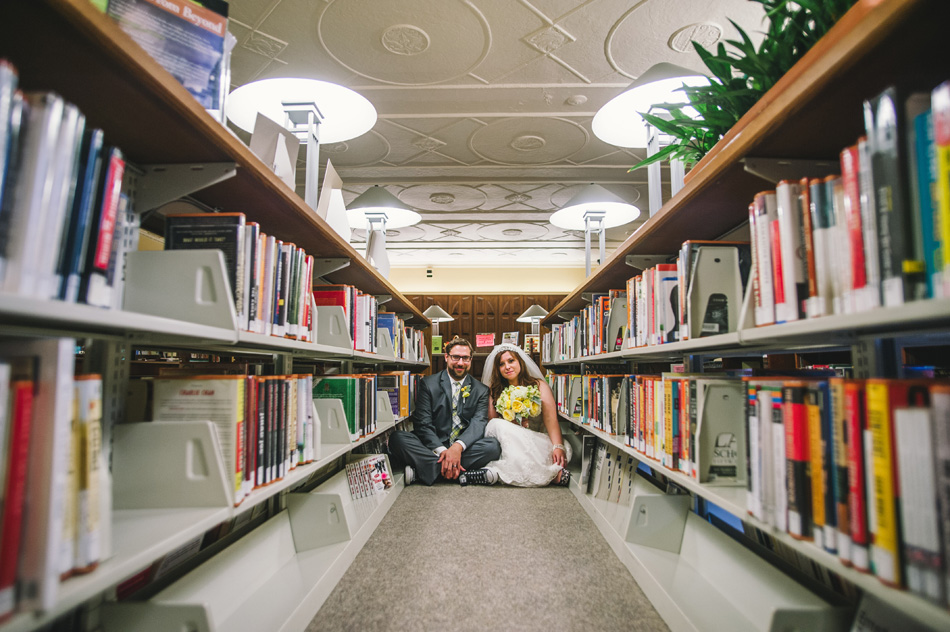 bride and groom in book tunnel