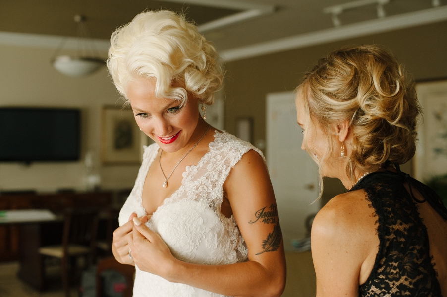 Brides puts on vintage wedding dress