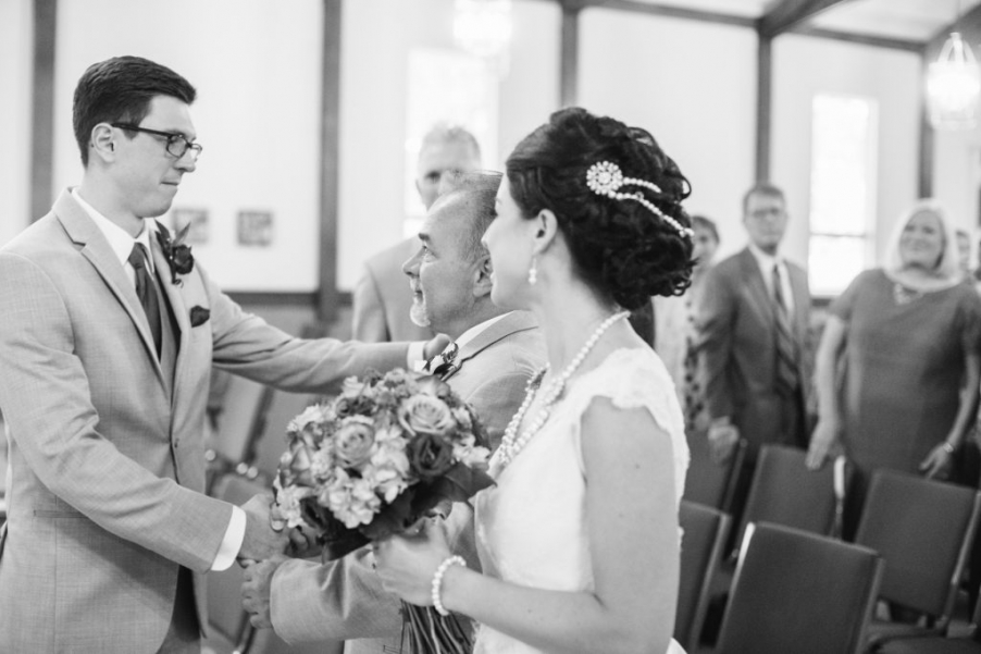father gives away bride